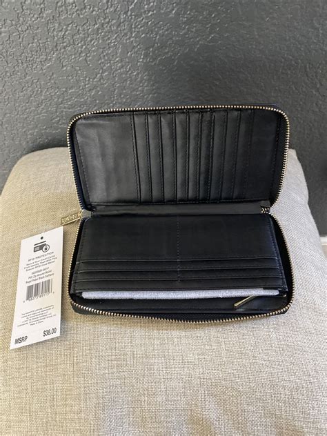 Nanette Lepore zip around wallet clutch with RFID protection